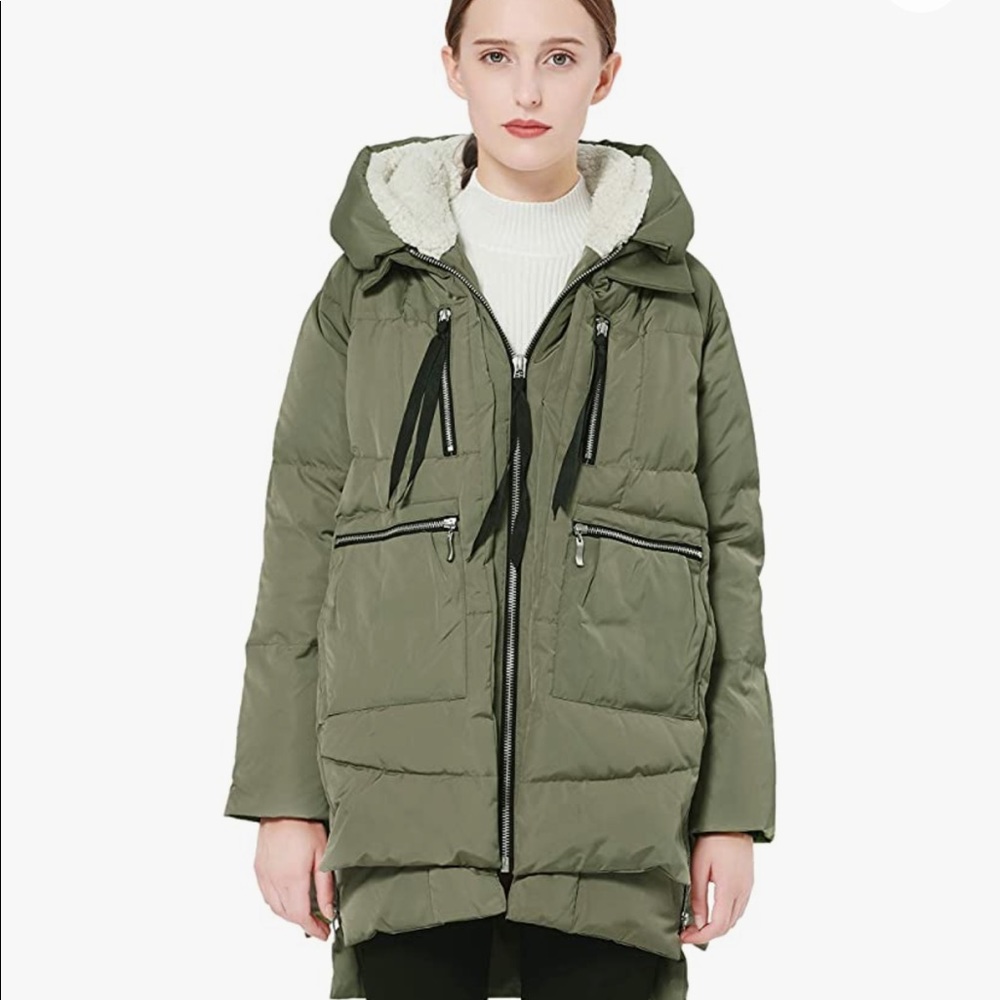 THE Amazon coat!  Versatile army green. Stylish and warm with lots of pockets.